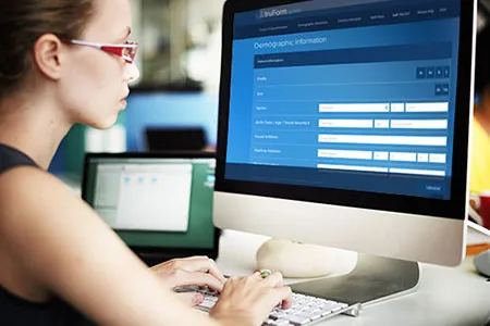 Patient filling out Pat Reg form