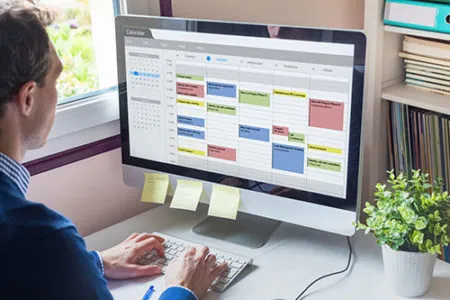 A man scheduling on computer